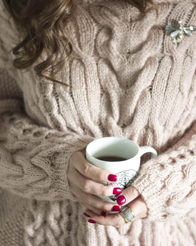 H1 Relaxation Finds for Stressful Weeks 10 woman holding a cup of coffee