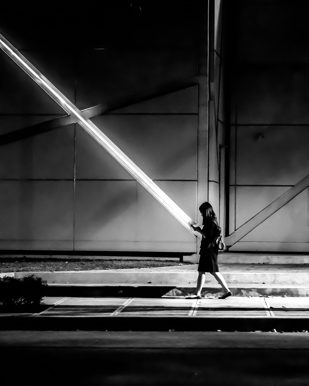 woman walking at night