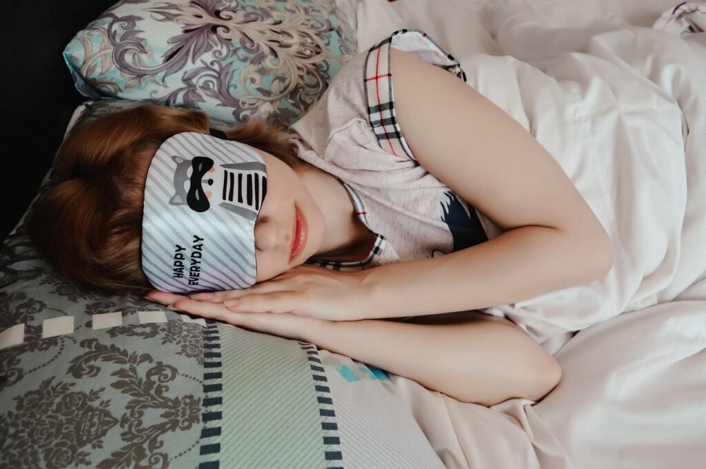 woman wearing sleeping mask