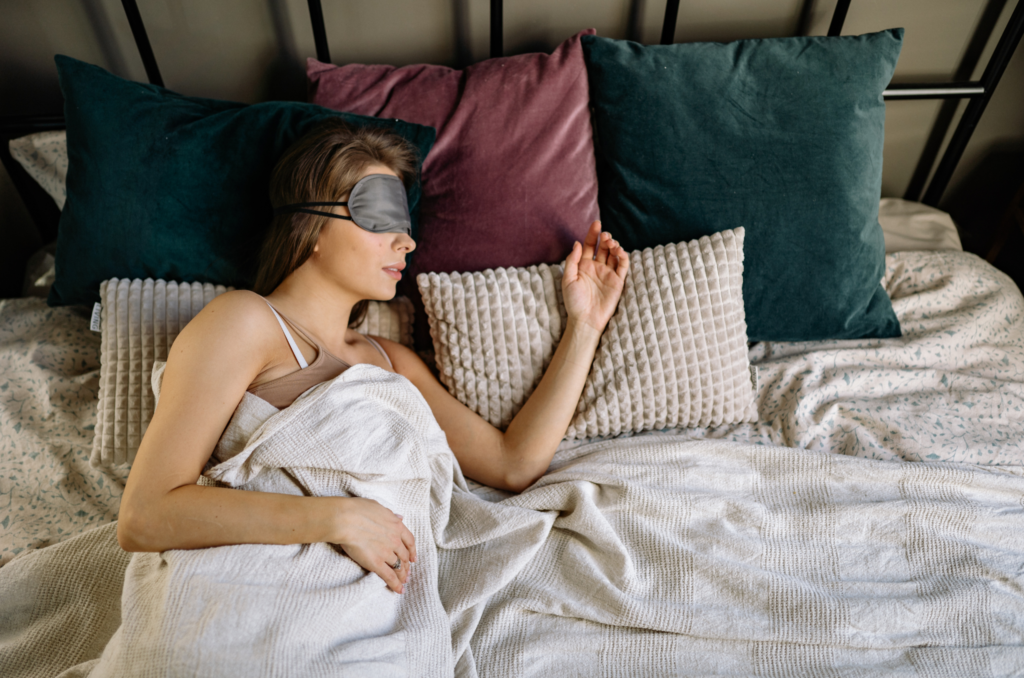 woman sleeping with too many pillows