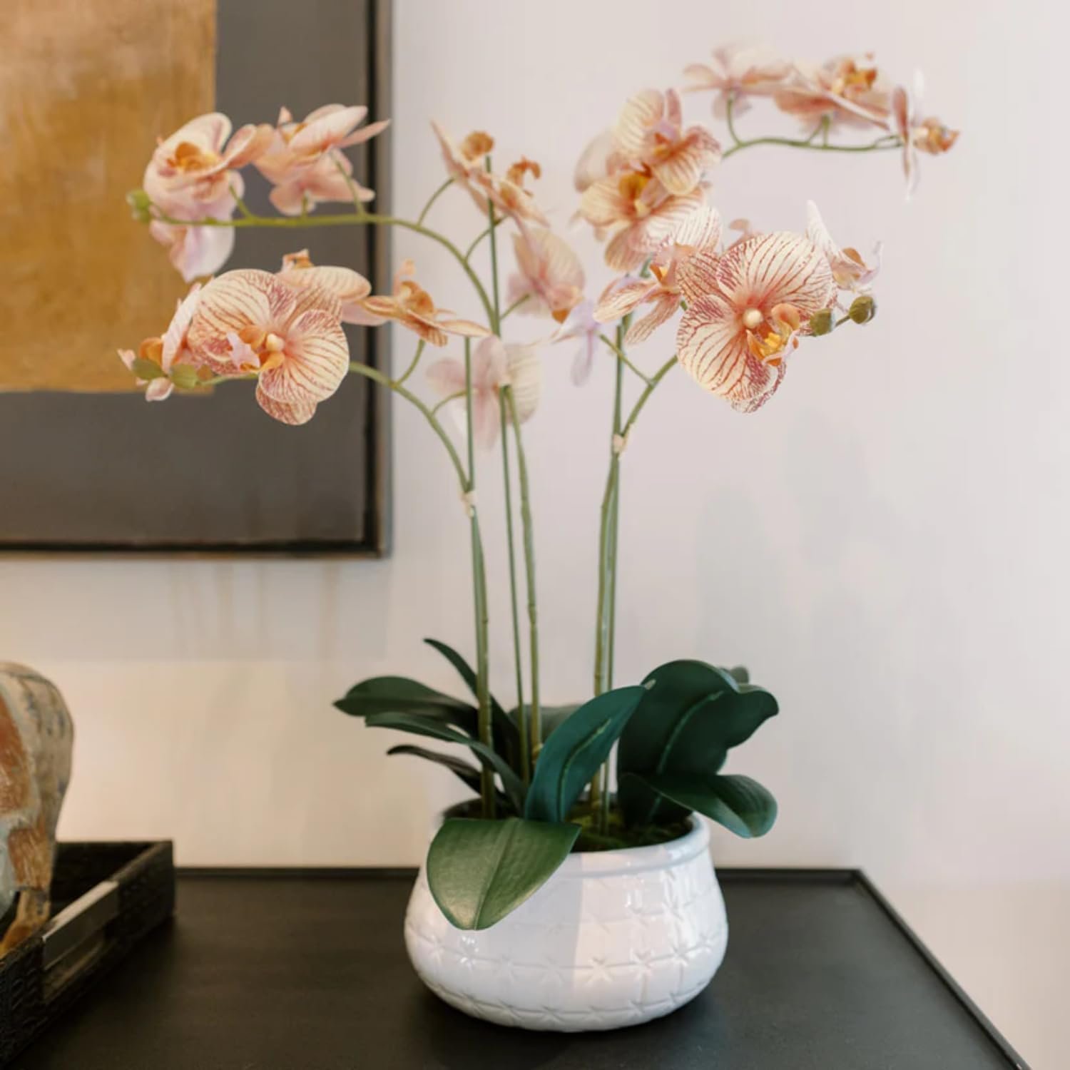 Coffee Table Styling Pieces That Make Your Living Room Look Expensive 34 1901 Faux Orange Orchid Plant White Planter Pot 1